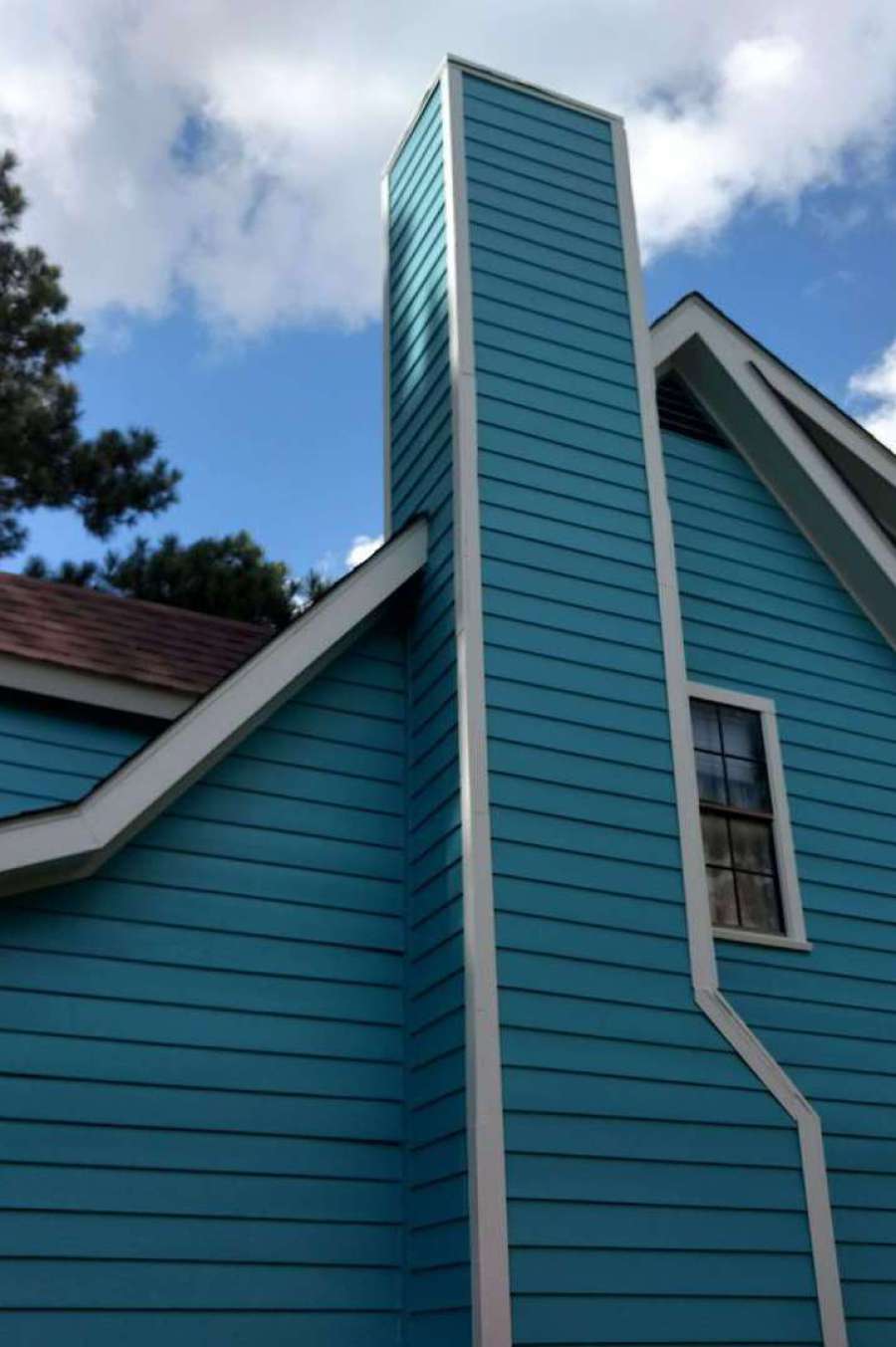 Freshly painted Teal Siding and Chimney