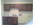 Utility Room Walnut Cabinets and Yellow Walls